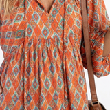 Aneta | Geometric Print V Neck Tiered Midi Dress
